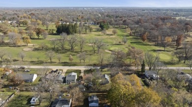 This cozy, updated cottage is the perfect retreat, offering on Ingersoll Golf Course and Learning Links in Illinois - for sale on GolfHomes.com, golf home, golf lot