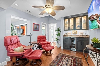 Unexpected and full of wonder, this refined 3-bedroom plus den on The Forest Country Club in Florida - for sale on GolfHomes.com, golf home, golf lot