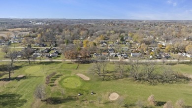 This cozy, updated cottage is the perfect retreat, offering on Ingersoll Golf Course and Learning Links in Illinois - for sale on GolfHomes.com, golf home, golf lot