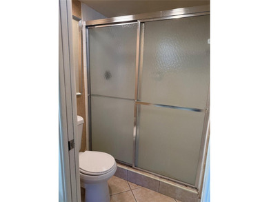 Beautiful upper level townhouse walking distance to the Club on Boca West Golf and Country Club in Florida - for sale on GolfHomes.com, golf home, golf lot