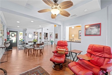 Unexpected and full of wonder, this refined 3-bedroom plus den on The Forest Country Club in Florida - for sale on GolfHomes.com, golf home, golf lot