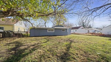 This cozy, updated cottage is the perfect retreat, offering on Ingersoll Golf Course and Learning Links in Illinois - for sale on GolfHomes.com, golf home, golf lot