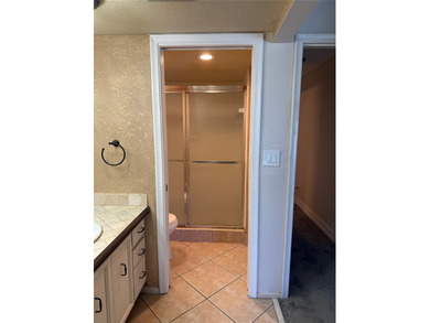 Beautiful upper level townhouse walking distance to the Club on Boca West Golf and Country Club in Florida - for sale on GolfHomes.com, golf home, golf lot