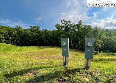 Experience the beauty of the Blue Ridge Mountains at The Village on Olde Beau Golf Course in North Carolina - for sale on GolfHomes.com, golf home, golf lot