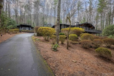 Located in Golf Club Estates, this modern residence, masterfully on The Country Club of Sapphire Valley in North Carolina - for sale on GolfHomes.com, golf home, golf lot