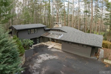 Located in Golf Club Estates, this modern residence, masterfully on The Country Club of Sapphire Valley in North Carolina - for sale on GolfHomes.com, golf home, golf lot