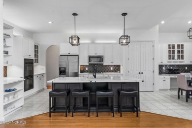 Perfectly positioned along the 7th hole of the prestigious on Porters Neck Country Club in North Carolina - for sale on GolfHomes.com, golf home, golf lot