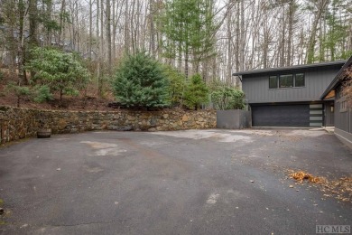 Located in Golf Club Estates, this modern residence, masterfully on The Country Club of Sapphire Valley in North Carolina - for sale on GolfHomes.com, golf home, golf lot