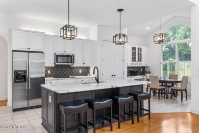 Perfectly positioned along the 7th hole of the prestigious on Porters Neck Country Club in North Carolina - for sale on GolfHomes.com, golf home, golf lot