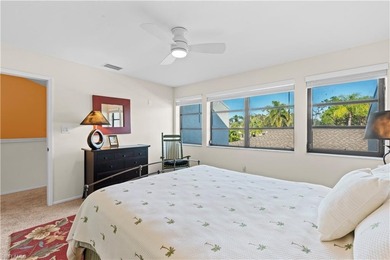 This refined 3-bedroom plus den residence showcases breathtaking on The Forest Country Club in Florida - for sale on GolfHomes.com, golf home, golf lot