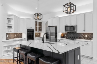 Perfectly positioned along the 7th hole of the prestigious on Porters Neck Country Club in North Carolina - for sale on GolfHomes.com, golf home, golf lot