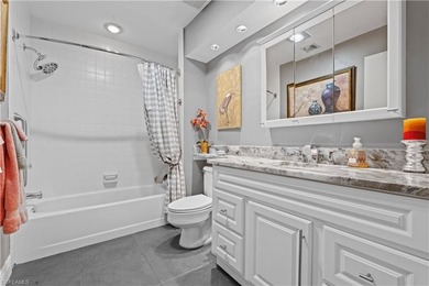 This refined 3-bedroom plus den residence showcases breathtaking on The Forest Country Club in Florida - for sale on GolfHomes.com, golf home, golf lot