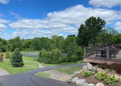 Stunning 3 bedroom, 2 bath home in the prestigious Metamora Golf on Metamora Country Club in Michigan - for sale on GolfHomes.com, golf home, golf lot