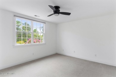 Perfectly positioned along the 7th hole of the prestigious on Porters Neck Country Club in North Carolina - for sale on GolfHomes.com, golf home, golf lot