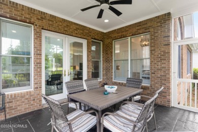 Perfectly positioned along the 7th hole of the prestigious on Porters Neck Country Club in North Carolina - for sale on GolfHomes.com, golf home, golf lot