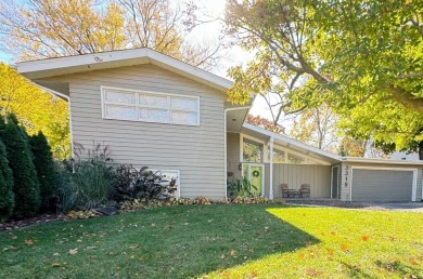 Stunning mid-century contemporary tri-level with inground pool on Forest Hills Country Club in Illinois - for sale on GolfHomes.com, golf home, golf lot