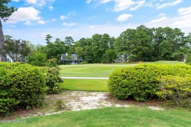 Perfectly positioned along the 7th hole of the prestigious on Porters Neck Country Club in North Carolina - for sale on GolfHomes.com, golf home, golf lot