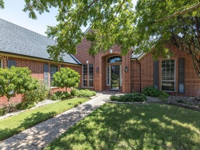 THIS 3,145 SQ FT HOME, NESTLED IN THE GATED NEIGHBORHOOD OF on Trophy Club of Dallas in Texas - for sale on GolfHomes.com, golf home, golf lot