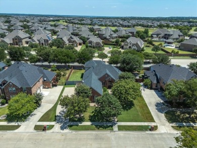 THIS 3,145 SQ FT HOME, NESTLED IN THE GATED NEIGHBORHOOD OF on Trophy Club of Dallas in Texas - for sale on GolfHomes.com, golf home, golf lot