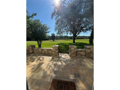Beautiful ground floor unit with expansive new paver patio that on Country Club At Silver Springs Shores in Florida - for sale on GolfHomes.com, golf home, golf lot