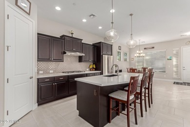 Discover the perfect blend of style and convenience in this lock on Verrado Golf Club - Victory in Arizona - for sale on GolfHomes.com, golf home, golf lot