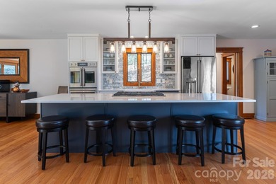 Welcome to this exquisitely renovated luxury mountain retreat on Kenmure Country Club in North Carolina - for sale on GolfHomes.com, golf home, golf lot