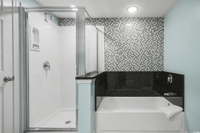 Discover this luxury retreat in the heart of Barefoot Resort in on Barefoot Resort and Golf Club  in South Carolina - for sale on GolfHomes.com, golf home, golf lot