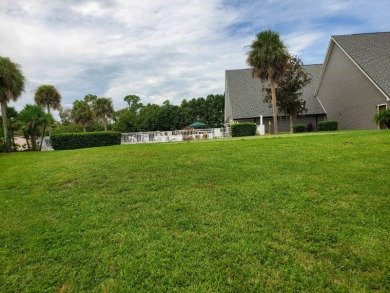 Discover easy Florida living in this 2-bedroom, 2-bath home on Lake Henry Golf Club in Florida - for sale on GolfHomes.com, golf home, golf lot