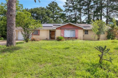 Located on a large corner lot this property is ready for its on Hearne Municipal Golf Course in Texas - for sale on GolfHomes.com, golf home, golf lot