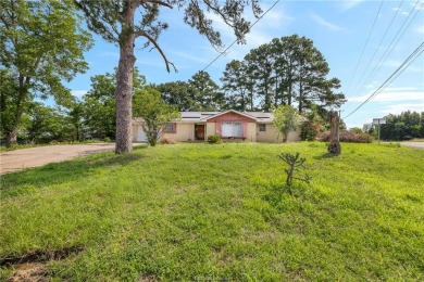 Located on a large corner lot this property is ready for its on Hearne Municipal Golf Course in Texas - for sale on GolfHomes.com, golf home, golf lot