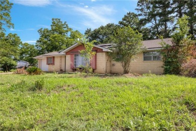 Located on a large corner lot this property is ready for its on Hearne Municipal Golf Course in Texas - for sale on GolfHomes.com, golf home, golf lot