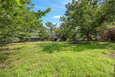 Located on a large corner lot this property is ready for its on Hearne Municipal Golf Course in Texas - for sale on GolfHomes.com, golf home, golf lot