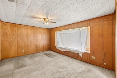 Located on a large corner lot this property is ready for its on Hearne Municipal Golf Course in Texas - for sale on GolfHomes.com, golf home, golf lot
