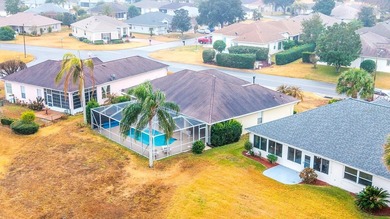 Under contract-accepting backup offers. Pool home with golf on Stonecrest Golf and Club Club in Florida - for sale on GolfHomes.com, golf home, golf lot