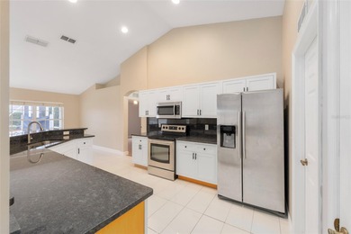 Under contract-accepting backup offers. Pool home with golf on Stonecrest Golf and Club Club in Florida - for sale on GolfHomes.com, golf home, golf lot