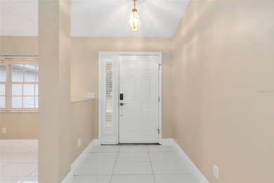 Under contract-accepting backup offers. Pool home with golf on Stonecrest Golf and Club Club in Florida - for sale on GolfHomes.com, golf home, golf lot