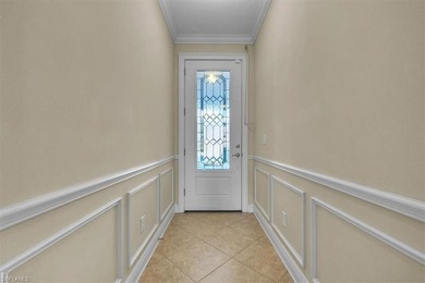 Offered TURNKEY and complete with a 4-seater golf cart, this on River Hall Country Club in Florida - for sale on GolfHomes.com, golf home, golf lot