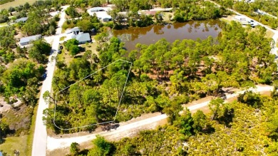 Spacious lakefront lot in Tropical Gulf Acres, offering a serene on Seminole Lakes Country Club in Florida - for sale on GolfHomes.com, golf home, golf lot