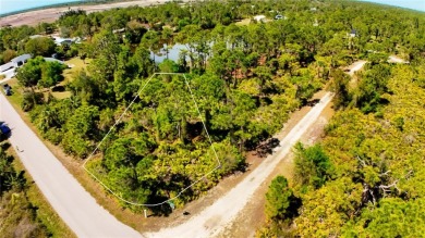 Spacious lakefront lot in Tropical Gulf Acres, offering a serene on Seminole Lakes Country Club in Florida - for sale on GolfHomes.com, golf home, golf lot