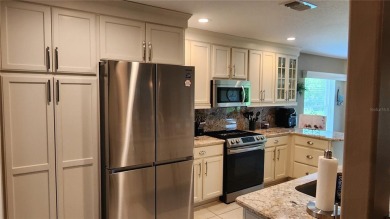 Turnkey, updated, maintained with an open checkbook, and on a on Summerglen Country Club in Florida - for sale on GolfHomes.com, golf home, golf lot