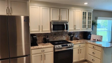 Turnkey, updated, maintained with an open checkbook, and on a on Summerglen Country Club in Florida - for sale on GolfHomes.com, golf home, golf lot