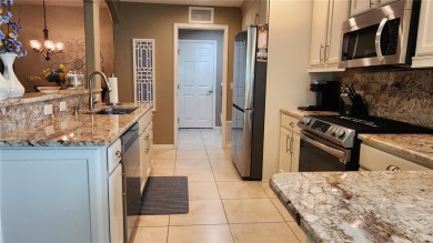 Turnkey, updated, maintained with an open checkbook, and on a on Summerglen Country Club in Florida - for sale on GolfHomes.com, golf home, golf lot