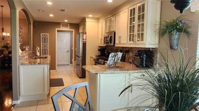 Turnkey, updated, maintained with an open checkbook, and on a on Summerglen Country Club in Florida - for sale on GolfHomes.com, golf home, golf lot