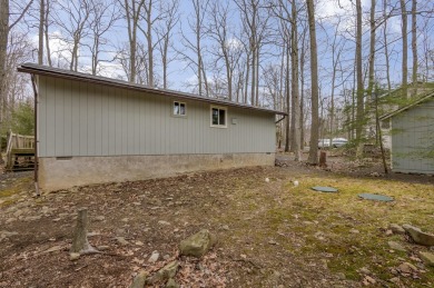 BACK ON MARKET! Cozy 2 bed 1 bath chalet home in golf community on Pocono Farms Country Club in Pennsylvania - for sale on GolfHomes.com, golf home, golf lot