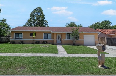 Discover your dream home in this beautifully designed residence on Palmetto Golf Course in Florida - for sale on GolfHomes.com, golf home, golf lot