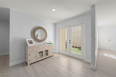 Set within the prestigious Fiddlesticks Country Club, this on Fiddlesticks Country Club in Florida - for sale on GolfHomes.com, golf home, golf lot