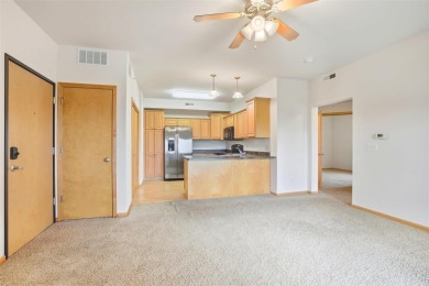 First-Floor Condo Near Blue Top Ridge Golf Course  Welcome to on Blue Top Ridge At Riverside in Iowa - for sale on GolfHomes.com, golf home, golf lot