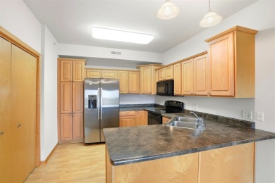 First-Floor Condo Near Blue Top Ridge Golf Course  Welcome to on Blue Top Ridge At Riverside in Iowa - for sale on GolfHomes.com, golf home, golf lot
