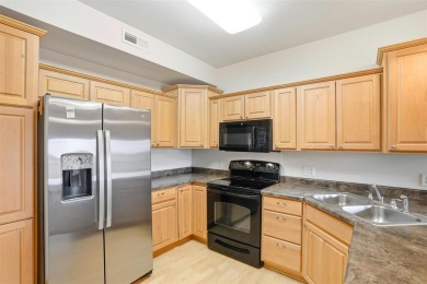 First-Floor Condo Near Blue Top Ridge Golf Course  Welcome to on Blue Top Ridge At Riverside in Iowa - for sale on GolfHomes.com, golf home, golf lot