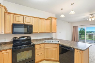 First-Floor Condo Near Blue Top Ridge Golf Course  Welcome to on Blue Top Ridge At Riverside in Iowa - for sale on GolfHomes.com, golf home, golf lot